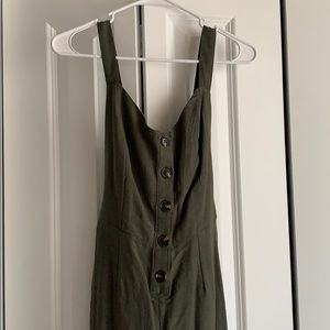 green jumpsuit